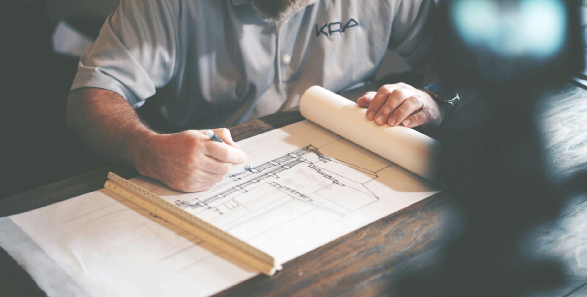 Business consultant reviewing financial reports with client in professional setting